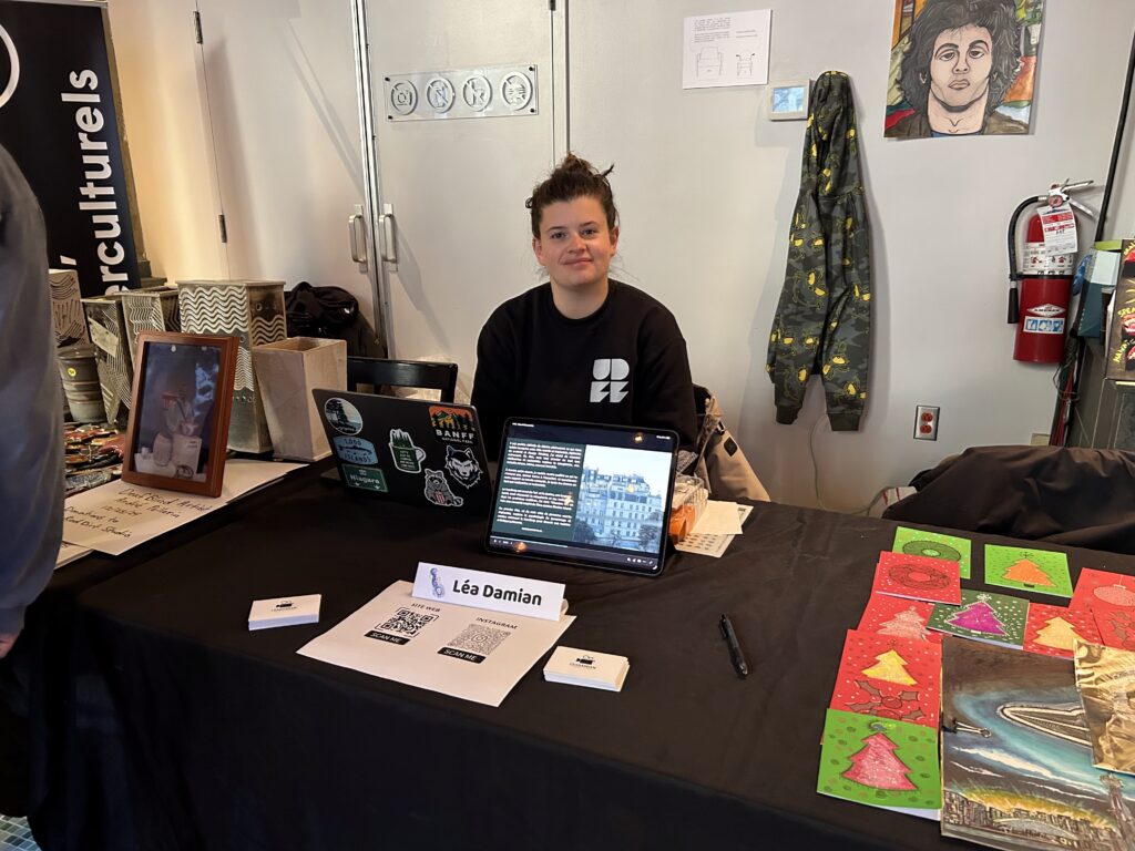 Léa Damian's booth with video and photos.